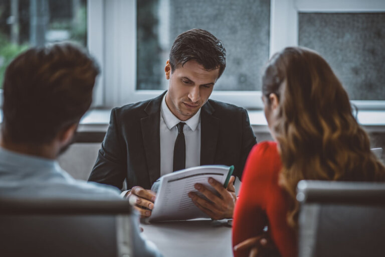 lawyer with couple who is filing for a divorce